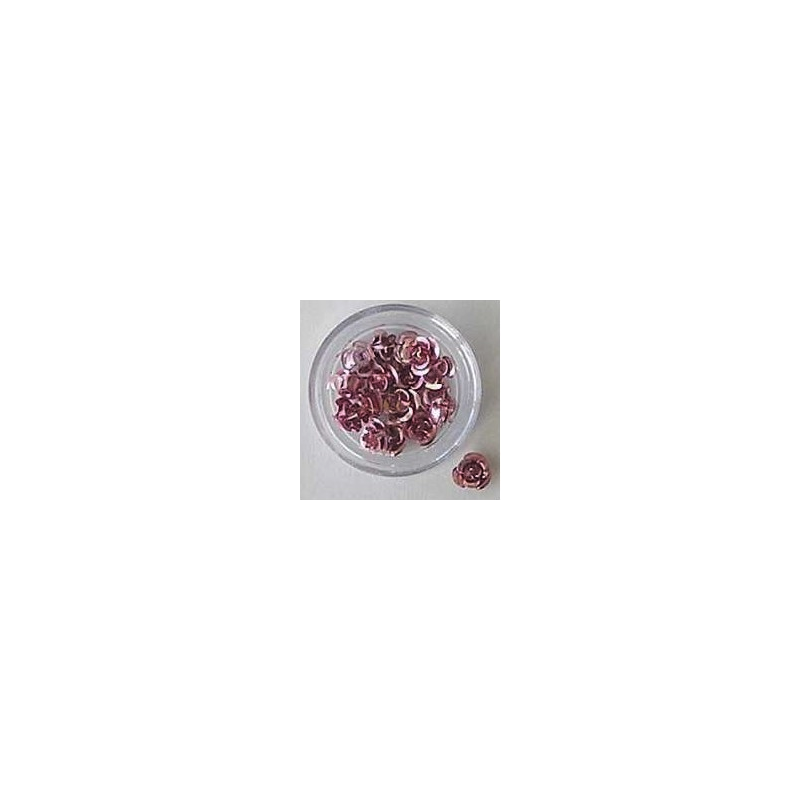 Decori per unghie in metallo a forma di rosellina. Colore rosa.