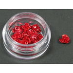 Decori per unghie in metallo a forma di rosellina. Colore rosso.