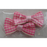 Decoro papillon di stoffa rosa a quadretti bianchi